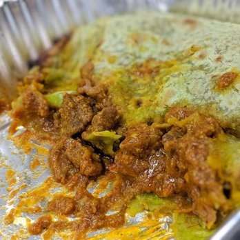 My Roti Place - Lamb with mama's curry on kale roti - Indian Near Me - Toronto, Ontario My Roti Place - Lamb with mama's curry on kale roti - Indian Near Me - Toronto, Ontario