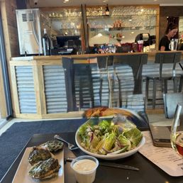 Oysters Rockefeller and wedge salad Oysters Rockefeller and wedge salad