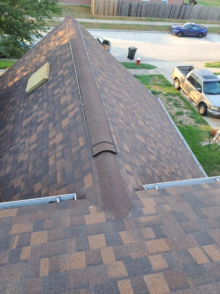 Slide of Truly Roofing & Construction