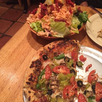 Upper Crust Pizza - Half eaten (I was starving) Veggie pizza and Salmon salad. De-lish! - Pizza Near Me - Santa Fe, New Mexico