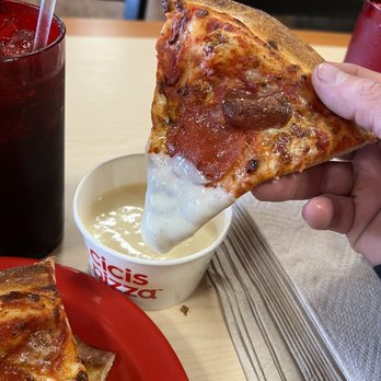 Cicis Pizza - Dipped in Alfredo sauce - Pizza Near Me - Aurora, Colorado