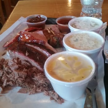 Hard Eight BBQ - Husbands tall order of ribs, ham, brisket, poppers, and jalapeño pork sausage. Sides were coleslaw, mac, and cream corn - Barbeque Near Me - Roanoke, Texas