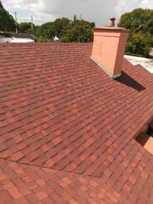 Slide of Red Apple Roofing