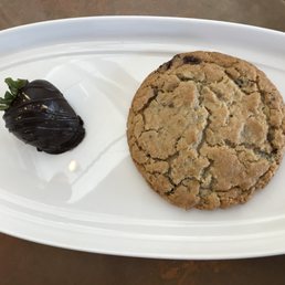 Sweet snack for two: a chocolate chip cookie and a chocolate covered strawberry! Sweet snack for two: a chocolate chip cookie and a chocolate covered strawberry!
