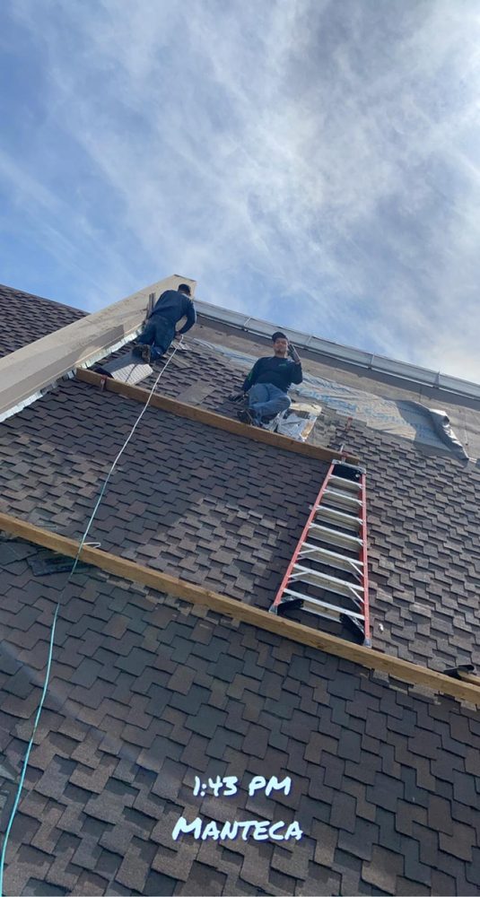 Slide of Albas Roofing