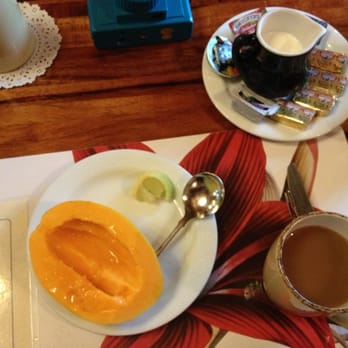 Kilauea Lodge - Breakfast starters included Papaya, coffee and hot cocoa for the kids - Hotels Near Me - Volcano, Hawaii Kilauea Lodge - Breakfast starters included Papaya, coffee and hot cocoa for the kids - Hotels Near Me - Volcano, Hawaii
