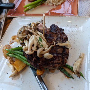 Amatista Cookhouse - True North Salmon 8oz. NY Strip Steak - Caribbean Near Me - Orlando, Florida