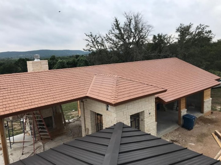 Slide of Green Knight Metal Roofing