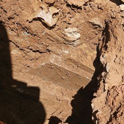 Mendoza House Leveling & Foundation Repair - Wood shim