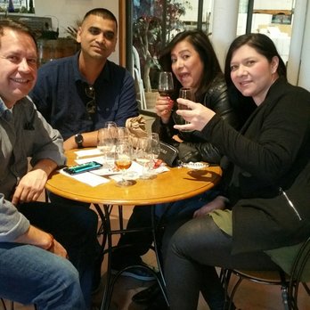 Giessinger Winery - a group of people sitting around a table - Wineries Near Me - Fillmore, California Giessinger Winery - a group of people sitting around a table - Wineries Near Me - Fillmore, California
