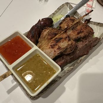 Nok’s Kitchen - #4 - BBQ Mix Plate ($24) but the Laos sausage and house sauce are the stars! - Laotian Near Me - Westminster, California Nok’s Kitchen - #4 - BBQ Mix Plate ($24) but the Laos sausage and house sauce are the stars! - Laotian Near Me - Westminster, California
