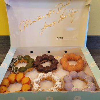 Mochi Lion - Matcha, chocolate, rose, passion fruit, caramel funnel cake, and taro - Donuts Near Me - Riverside, California