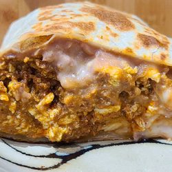 Crazyburrito Authentic Mexican Grill - Mexican Sausage (chorizo) breakfast burrito - cut in half