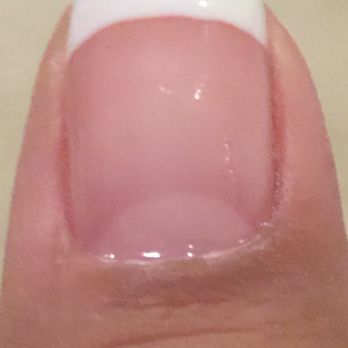 Jazzy's Nails Spa - Dust caught under polish and broken nail - Nail Salons Near Me - Whittier, California