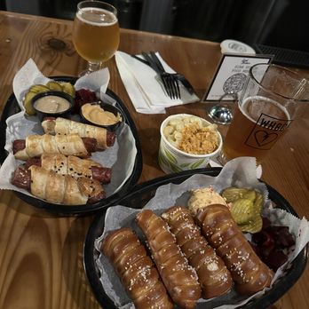 Winter Hill Brewing - Pigs in a blanket with mustard and a sweet chipotle mayo, side Mac and cheese, and pretzels with pimento dip - Breweries Near Me - Somerville, Massachusetts