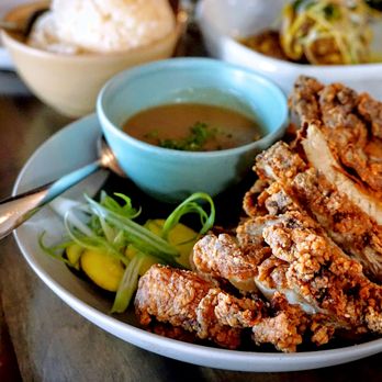 Musang Seattle - Musang Joy Fried Chicken: crispy fried buttermilk chicken thighs / musang gravy / zucchini turmeric pickles ($26). - Filipino Near Me - Seattle, Washington Musang Seattle - Musang Joy Fried Chicken: crispy fried buttermilk chicken thighs / musang gravy / zucchini turmeric pickles ($26). - Filipino Near Me - Seattle, Washington