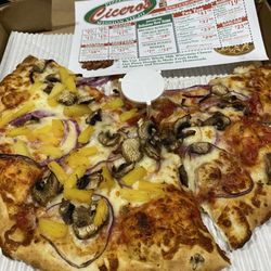 Cicero's Pizzeria - Our standard mushroom and onion pizza and then had to add pineapple on half for a guest.