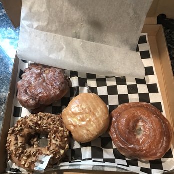 Rocco's Doughnut Company - Apple fritter, orange creamsicle, coffee roll and brown sugar pecan cakey donut - Donuts Near Me - Westborough, Massachusetts Rocco's Doughnut Company - Apple fritter, orange creamsicle, coffee roll and brown sugar pecan cakey donut - Donuts Near Me - Westborough, Massachusetts