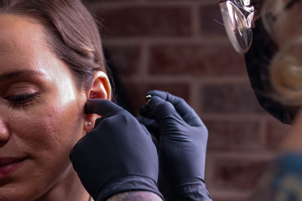 Wonderland Body Arts Logo