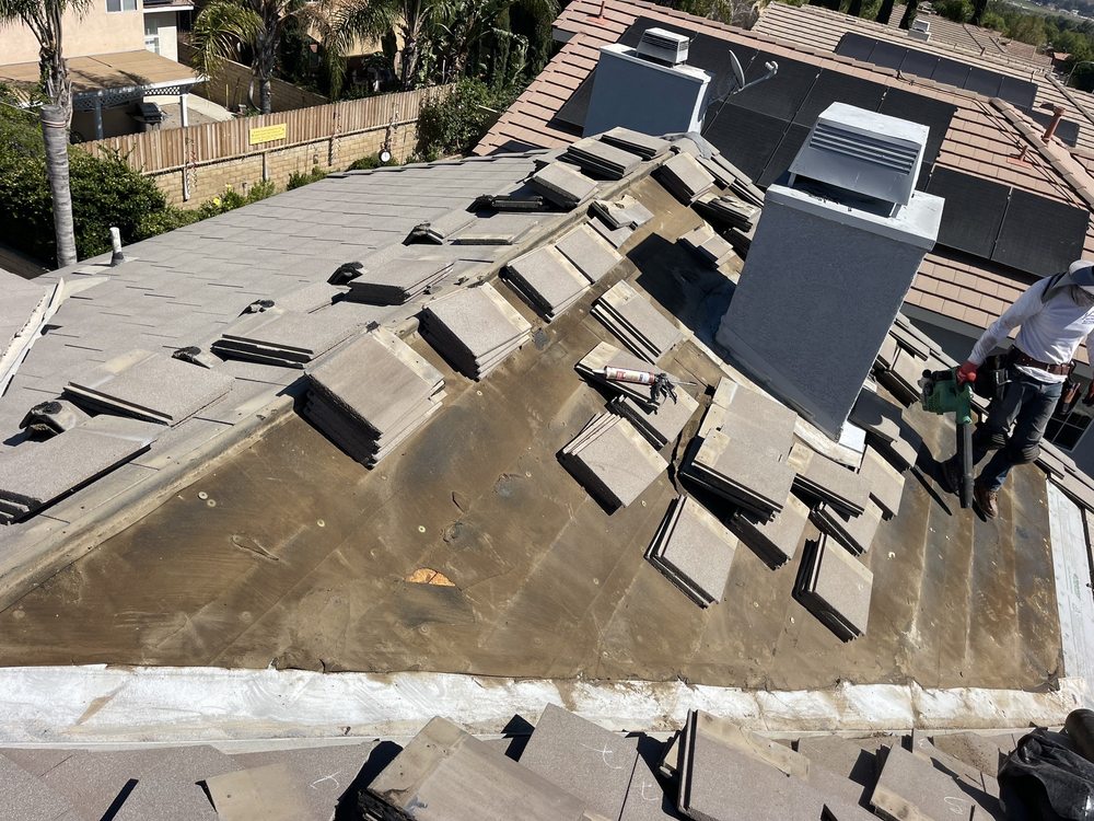 Slide of Adato Roofing