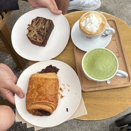 Matcha, Cafe con Panna, chocolate hazelnut croissant, banana bread Matcha, Cafe con Panna, chocolate hazelnut croissant, banana bread