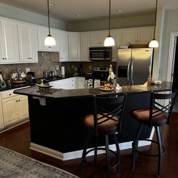 CertaPro Painters - Love this kitchen refresh with a bold accent cololr! - Painters Near Me - Columbus, Ohio