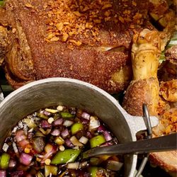 Casa Reyes - close up of the crispy pata with a delicious vinegar sauce.