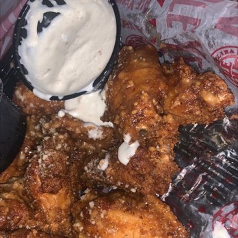 Carolina Ale House - Garlic parm wings. Crispy perfection - Sports Bars Near Me - Raleigh, North Carolina