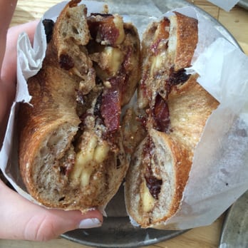 Bagelsaurus - T-Rex (with bacon) on a cinnamon raisin bagel! Yum! Sticky and delicious. - Bagels Near Me - Cambridge, Massachusetts