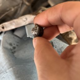 Snapped bolt head with silicone on it Snapped bolt head with silicone on it