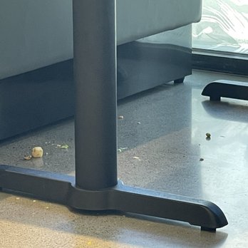 Salata - Dirty floors under tables - Salad Near Me - San Antonio, Texas