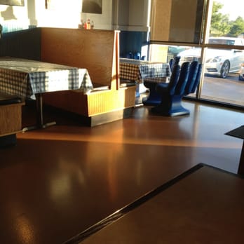 Mad Greek Grill - Dining area with that silly blue hand chair. Lol - Greek Near Me - High Point, North Carolina Mad Greek Grill - Dining area with that silly blue hand chair. Lol - Greek Near Me - High Point, North Carolina