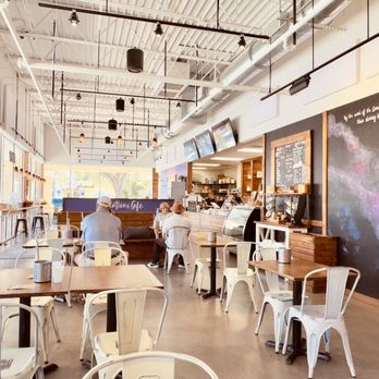 Revelations Cafe - the interior of a restaurant with tables and chairs - Breakfast & Brunch Near Me - Lutz, Florida