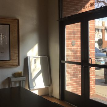 Cafeteria & Company - a view of a parking lot through a window - Coffee & Tea Near Me - Urbana, Illinois