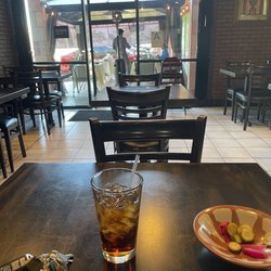 Mona's Kitchen - Indoor and outdoor dining.
