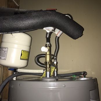 Grade A Plumbing - Modification isn't braced and is installed in the wrong spot. The pipe on the top right has wires exposed and they shouldn't be exposed. - Plumbing Near Me - Warrington, Pennsylvania