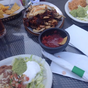El Metate - Allow me to introduce Mary Tierra; chorizo, steak, shrimp, & chicken on a sizzling charger. The 'double' can feed FOUR. - Mexican Near Me - Knoxville, Tennessee El Metate - Allow me to introduce Mary Tierra; chorizo, steak, shrimp, & chicken on a sizzling charger. The 'double' can feed FOUR. - Mexican Near Me - Knoxville, Tennessee