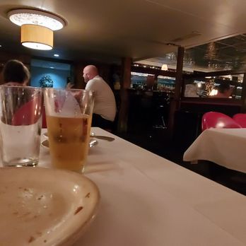 Maury's Tiny Cove - Empty plate - "had" a king cut of prime rib - delicious !  as my wife would testify. Photo is of main floor with bar in background. - Steakhouses Near Me - Cincinnati, Ohio