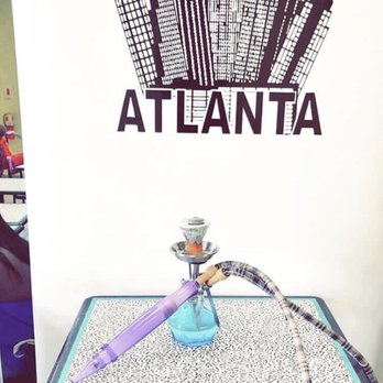 Sivas Express - a hook with a city skyline in the background - Mediterranean Near Me - Atlanta, Georgia Sivas Express - a hook with a city skyline in the background - Mediterranean Near Me - Atlanta, Georgia