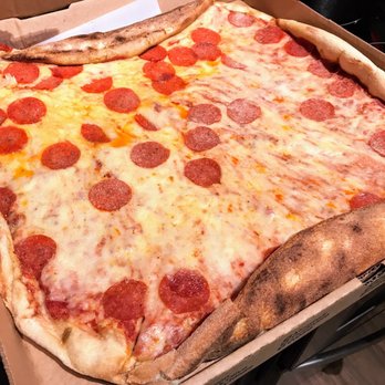 Luigi's Pizza - Pie so big that it barely fits in the box. - Pizza Near Me - Charlotte, North Carolina Luigi's Pizza - Pie so big that it barely fits in the box. - Pizza Near Me - Charlotte, North Carolina