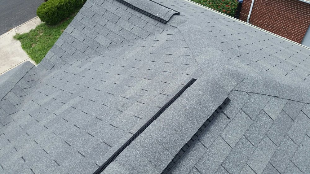 Slide of Alexanders Roofing