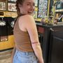 Photo of Hidden Hand Tattoo