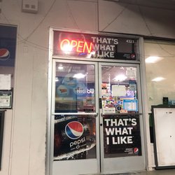 Front door with the open sign lit up.