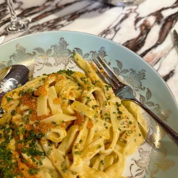 The Rosebud - a plate of pasta on a table - French Near Me - Toronto, Ontario The Rosebud - a plate of pasta on a table - French Near Me - Toronto, Ontario