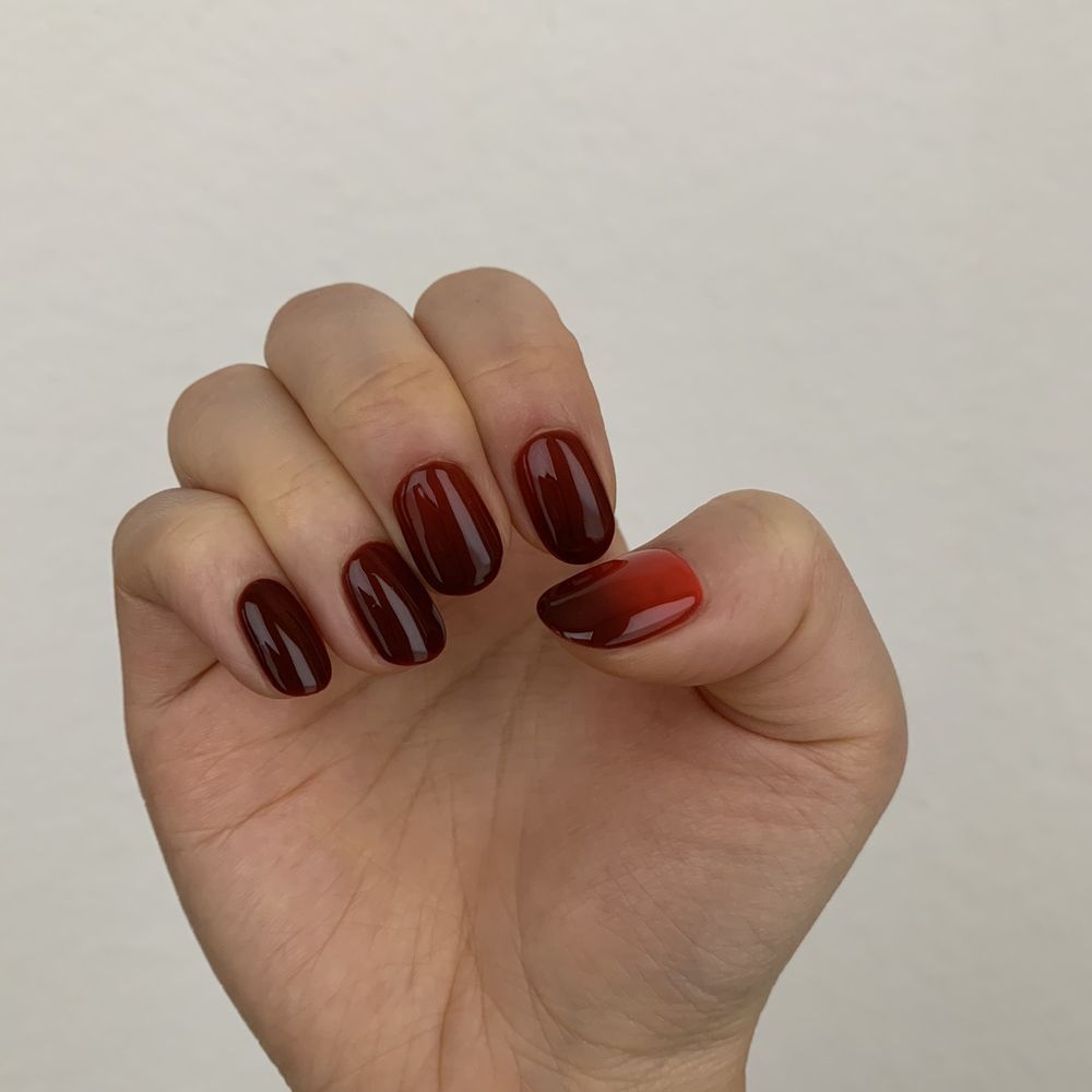 When your hands are cold your nails turn dark brown, and it shifts to red when you have warm hands. VERY COOL perfect for fall weather. When your hands are cold your nails turn dark brown, and it shifts to red when you have warm hands. VERY COOL perfect for fall weather.