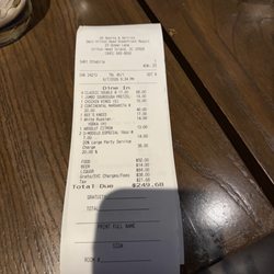 XO Sports & Spirits - 20% large party charge for 6 of us.... I normally tip at least 25% but they honestly did not deserve 20%