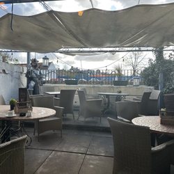 Churches Restaurant - The outdoor seating off peak hours. Coffee was served hot and it was fresh.