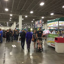 Convention floor is overrun with obnoxious parents pushing strollers. Yeah, they allow strollers! WHAT?