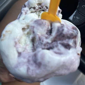 Hershey's Ice Cream  - Blueberry Cheesecake Ice Cream on waffle cone melting  in the Florida Sunshine - Ice Cream & Frozen Yogurt Near Me - Jacksonville, Florida