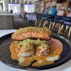 Currents Restaurant - Faroe Islands Salmon with Sea Scallops, pistachio and parsley topped